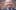 Bernard Donoghue Headshot ALVA 002 WEB A man wearing a suit stands smiling to camera in front of a brick wall.