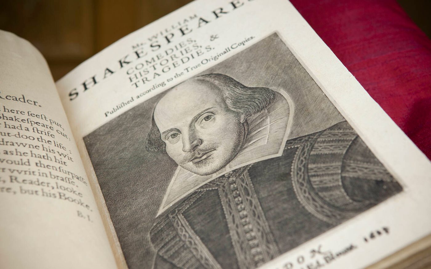 William Shakespeare First Folio The first page of an old book with an illustration of a man at the bottom