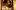 Hamlet 2022 Johan Persson (13) George Fouracres Sam Wanamaker Playhouse WEB An actor sits on a candlelit stage wearing a crown.