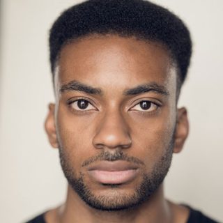 This is a headshot of Michael Elcock looking directly to camera.
