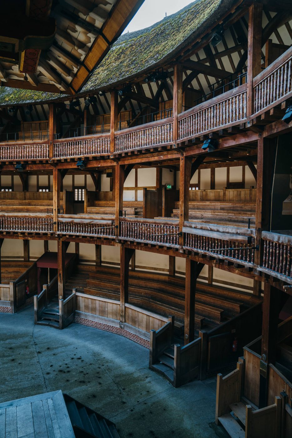 Our Empty Theatres Helen Murray Shakespeare's Globe 2 The view from the balcony of a theatre looks out to an empty seating area