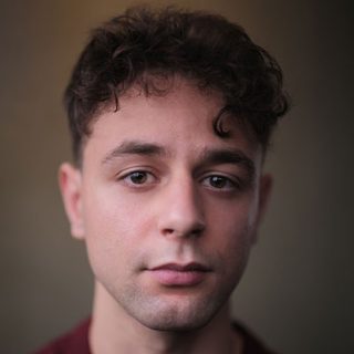 This is a headshot of Rawaed Asde looking directly at the camera.