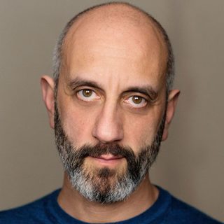 This is a headshot of Richard Katz looking directly to camera.