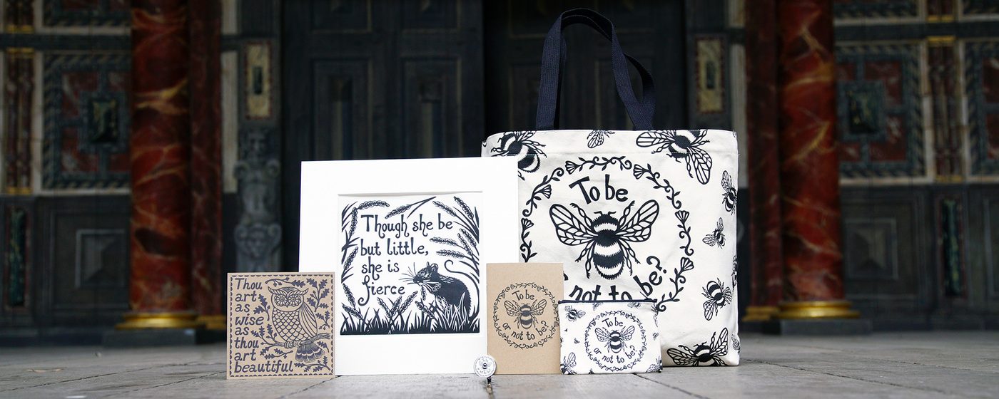 Rowan Tree Eco Range Shakespeare's Globe Shop A selection of white and beige products, including a print, card, tote bag, notebook and purse, featuring a illustrative screen printing design of bees, flowers, and animals.