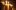 Sam Wanamaker Playhouse 2021 Sconces White candles line the edge of a theatre stage