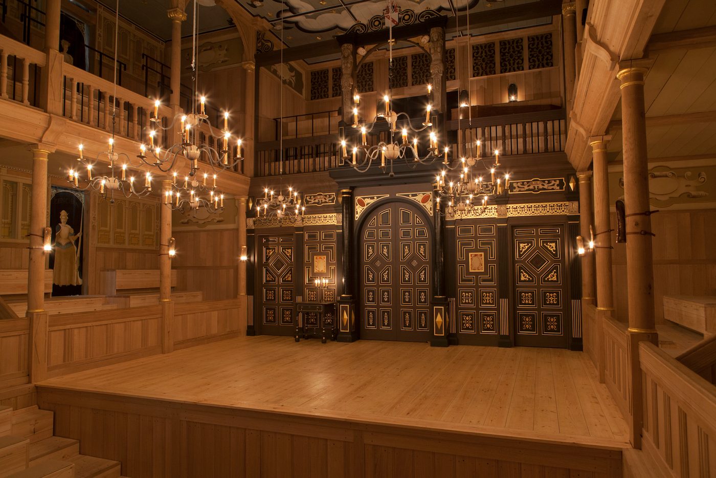 Sam Wanamaker Playhouse Pete Le May An indoor wooden playhouse lit by candles