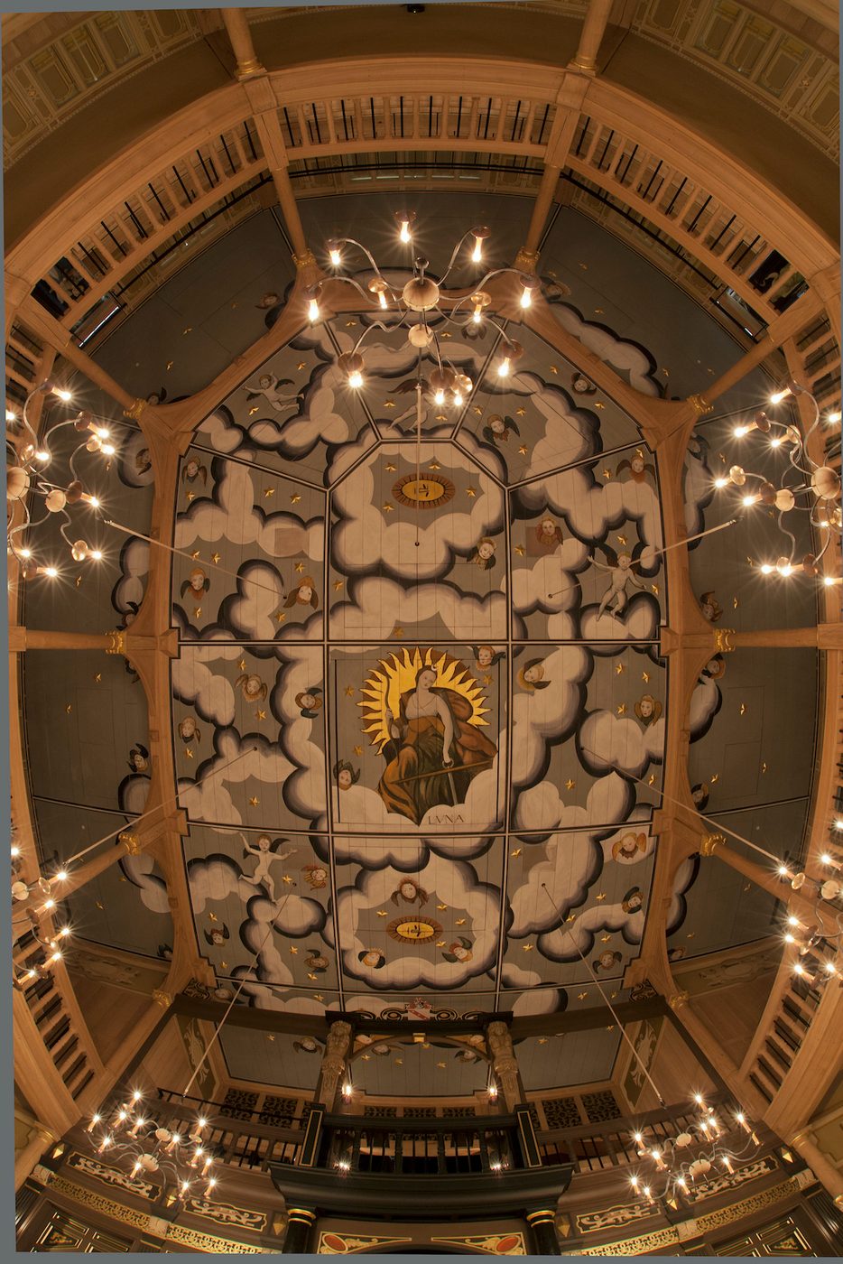 Sam Wanamaker Playhouse Candlelit Ceiling A decorated ceiling with candles