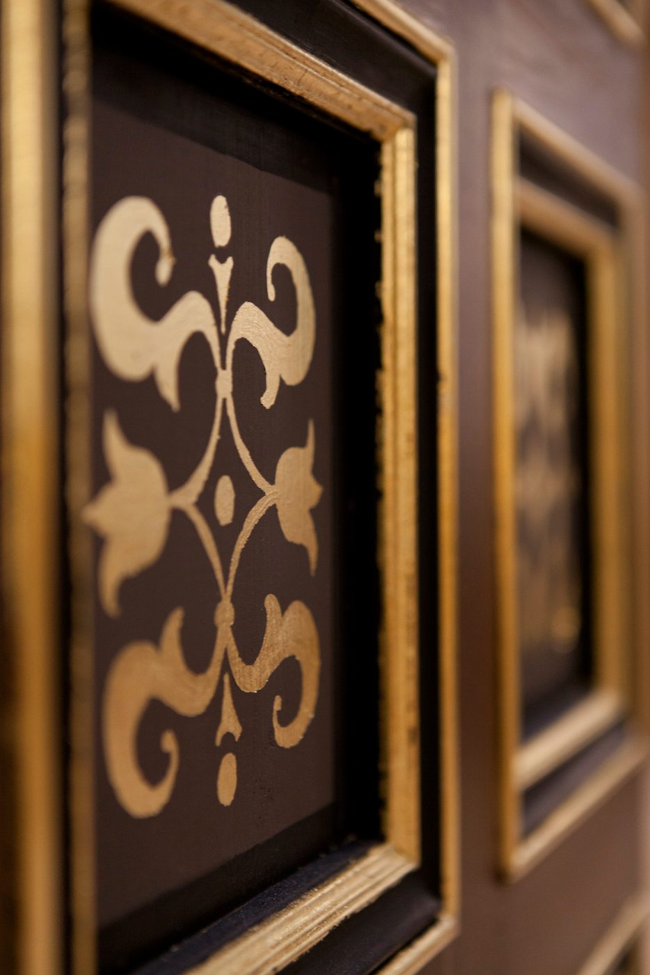 Sam Wanamaker Playhouse Pete Le May Detail on a black wall shows gold patterns