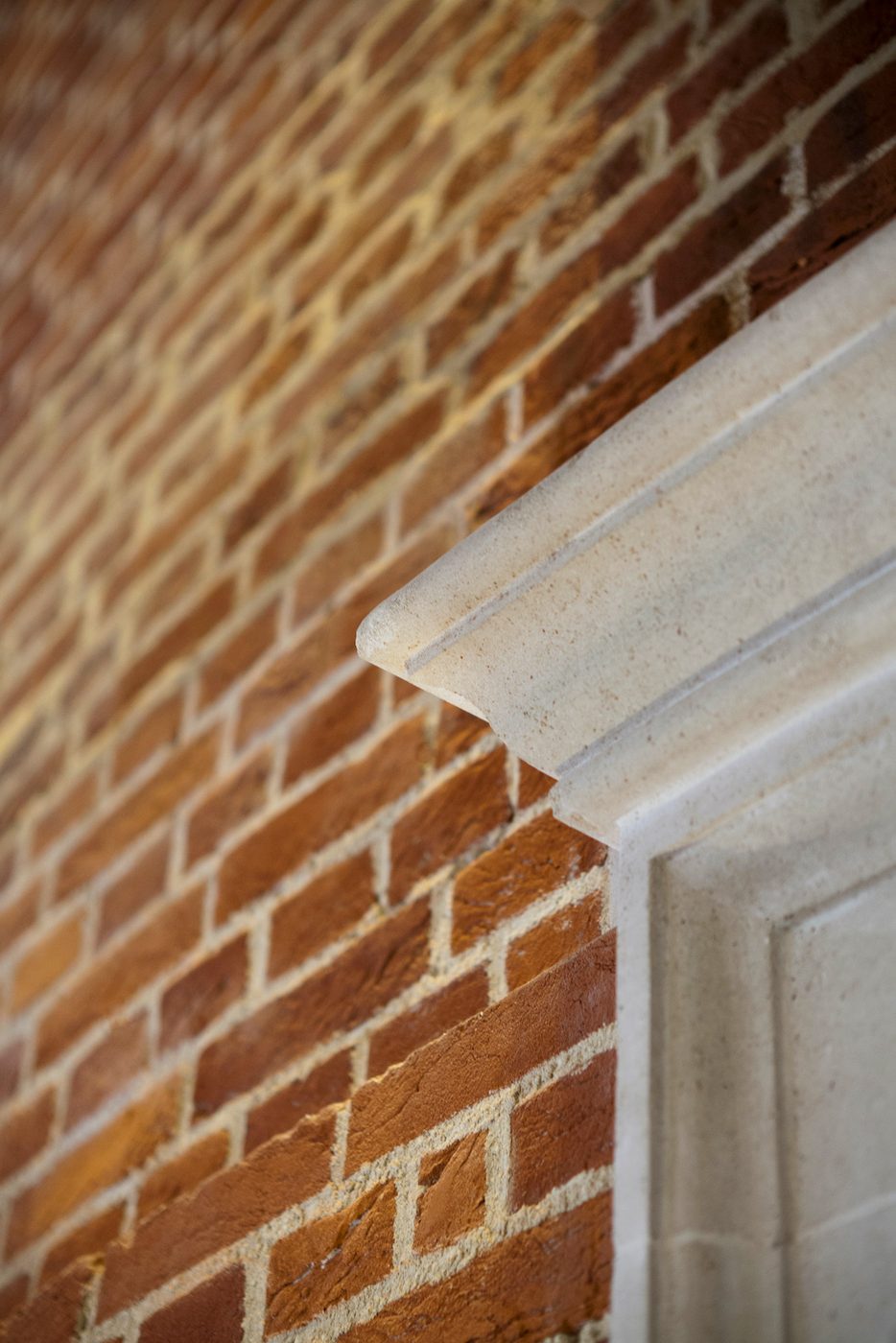 Sam Wanamaker Playhouse Pete Le May Details of a white door frame against a brick building