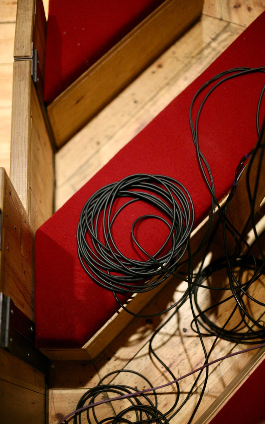 Sam Wanamaker Playhouse Recording Studio Blog Coiled up cables resting on one of the seats in the Sam Wanamaker Playhouse
