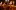 Spooky Stories Sam Wanamaker Playhouse A close up of a candelabra with a lit candle in the Sam Wanamaker Playhouse