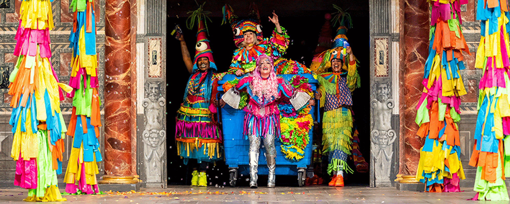 Dream 2021-2000x800 Actors in colourful costume on stage during the 2021 production of A Midsummer Night's Dream.